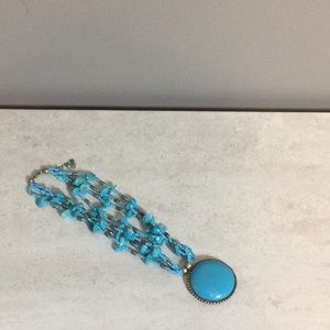 9.5” 4 strand turquoise shell bead with round turquoise drop